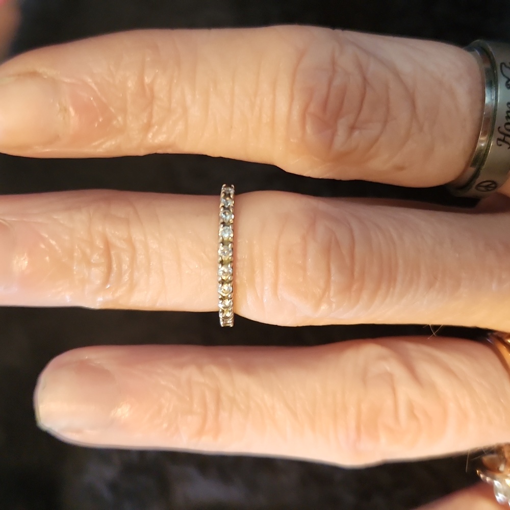 Sterling Silver size 4.5 cz band ring. Barely worn.